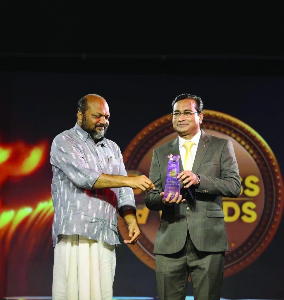 Receiving the Travel Icon Award in Tourism from P. Rajeev, Hon’ble Minister for Law, Industries & Coir, at the 24 Channel Business Awards 2025
